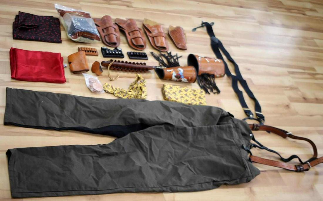 QUICK DRAW SHOOTER CUFFS HOLSTERS RELATED GEAR: Includes 2 5 1/2 inch Colt single action holsters El Paso, a lone S.A. El Paso 5 1/2 inch holster, single 3 3/4 inch El Paso holster, Frontier Classics size 42 saddle pants with suspenders, Neckerchie