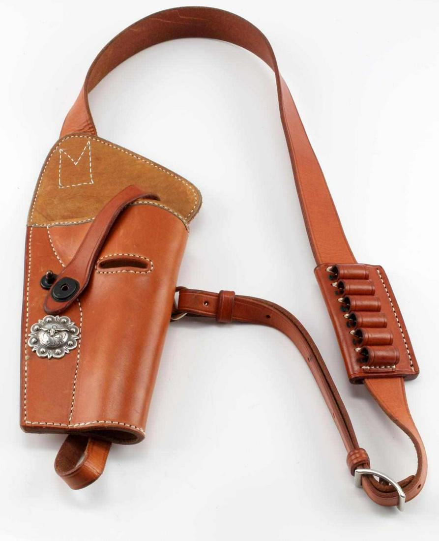 EL PASO SADDELRY 1942 TANKERS BLACKHAWK HOLSTER: Sold out at factory, this gently used number 142 for 71/2 inch Blackhawk Ruger, has added sterling longhorn rosette added.