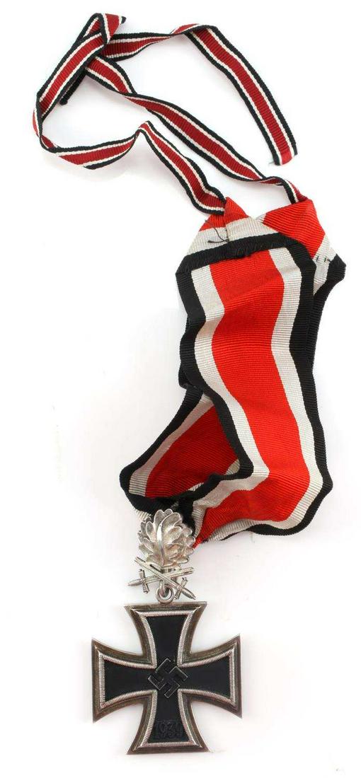 WWII GERMAN SILVER KNIGHTS CROSS SECOND CLASS: Second Class Knights Cross With Original Tri-Color Ribbon. Black cross has a magnetic iron core and is encased in .800 silver. 1939 is on the obverse. 1813 is on the reverse. Oak leaf pin with crossed