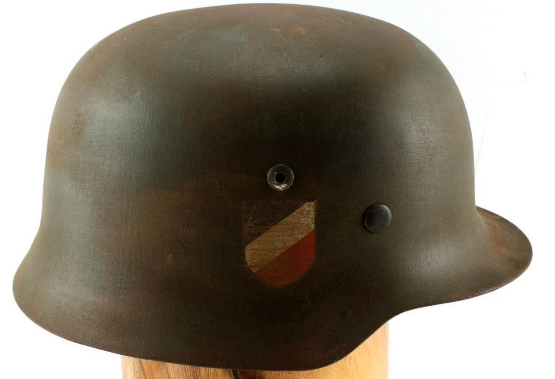 WWII GERMAN THIRD REICH HEER HELMET M 38: WWII German Third Reich Heer (Army) helmet. Double decal version with tri-color national shield on one side and Reichsadler on other. Slightly used but overall good condition, has been artificially co