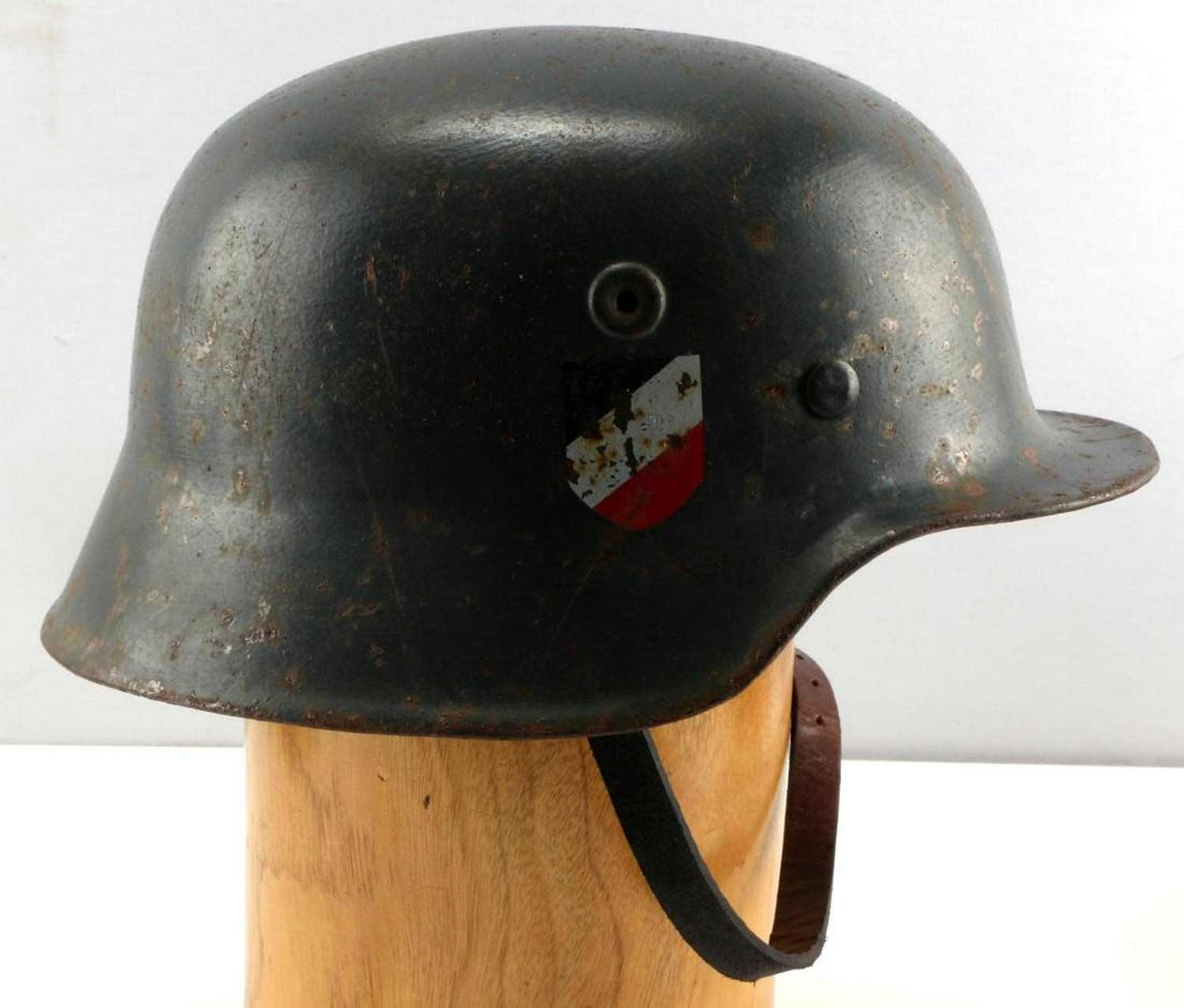 WWII GERMAN THIRD REICH LUFTWAFFE HELMET M 40: WWII German Luftwaffe Helmet. Double decal version with tri-color national shield on one side and Luftwaffe eagle on other. Rear stamped 4035, left ear stamped O68, 9 finger liner. Some wear and rust 