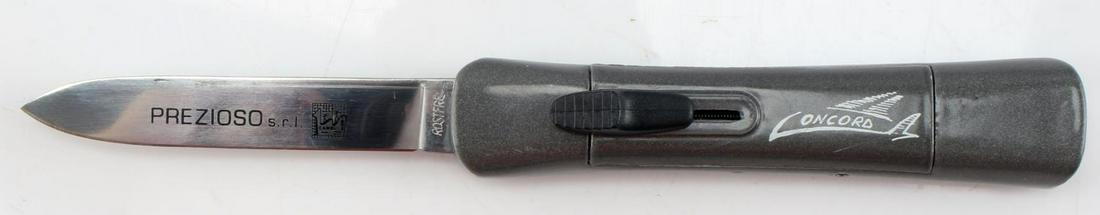 ITALIAN CONCORD PREZIOSO SWITCHBLADE KNIFE: Italian stainless steel switchblade knife, double action. Very good condition, has safety stop. Made by Concord. Blade measures 3 1/4" long.