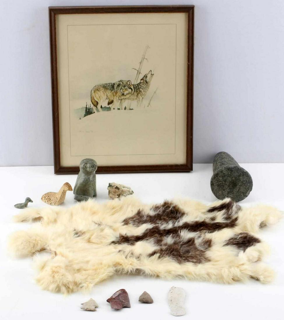 NATIVE AMERICAN ARROWHEAD AND INUIT ART LOT: Vintage wolf print, 13x11 inches, rabbit skin 18x10 inches, arrow heads and tool artifacts retrieved in Florida. Hard stone owl and waterfowl carving from Alaska