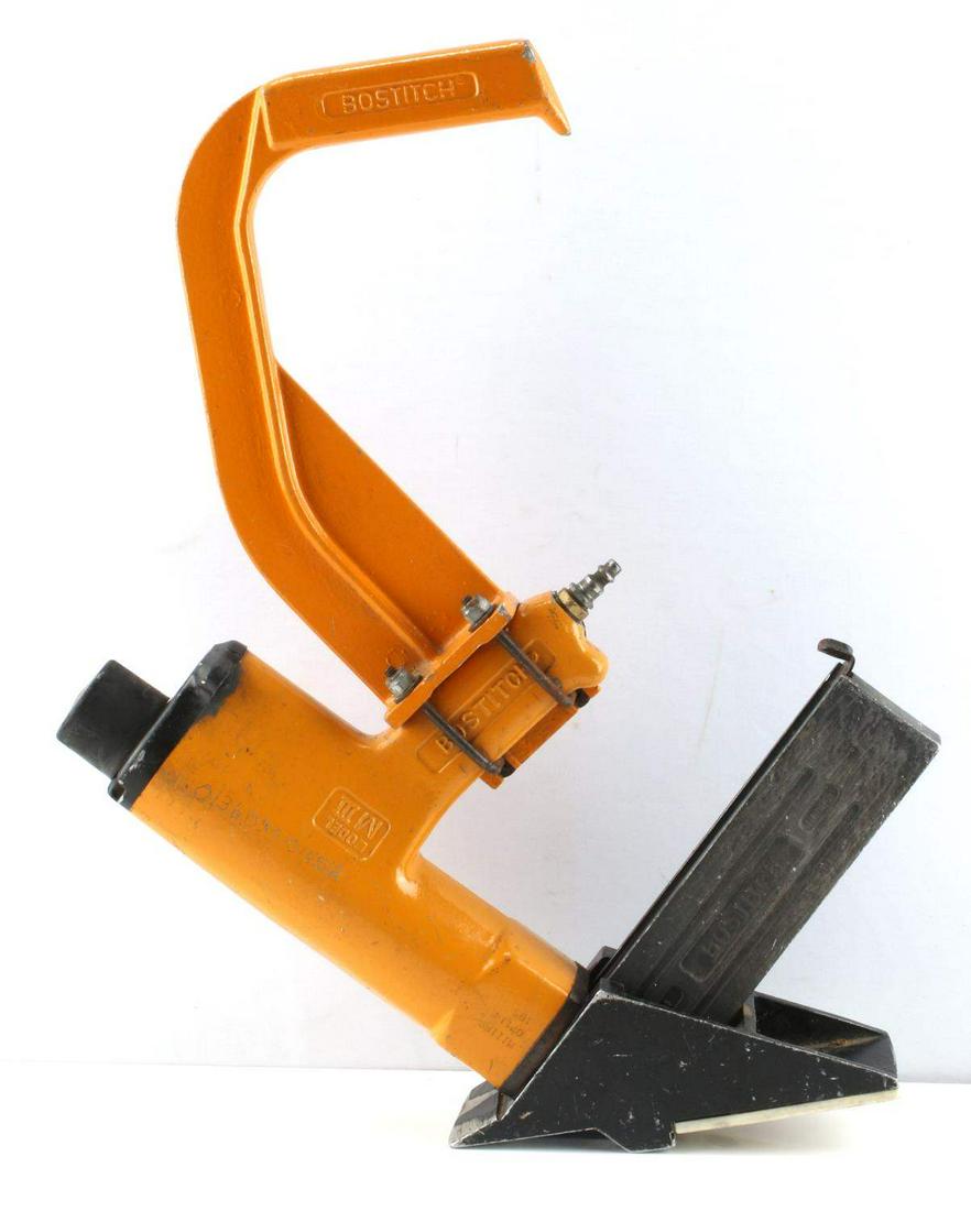 BOSTITCH MIII COMPRESSED AIR FLOOR NAILER YELLOW: Bostitch Model M3 Pneumatic Hardwood Floor Nailer. Yellow and black in color. Serial number 01360551014512 is inscribed on the side from a previous owner. Some scratches and rust are present from prev