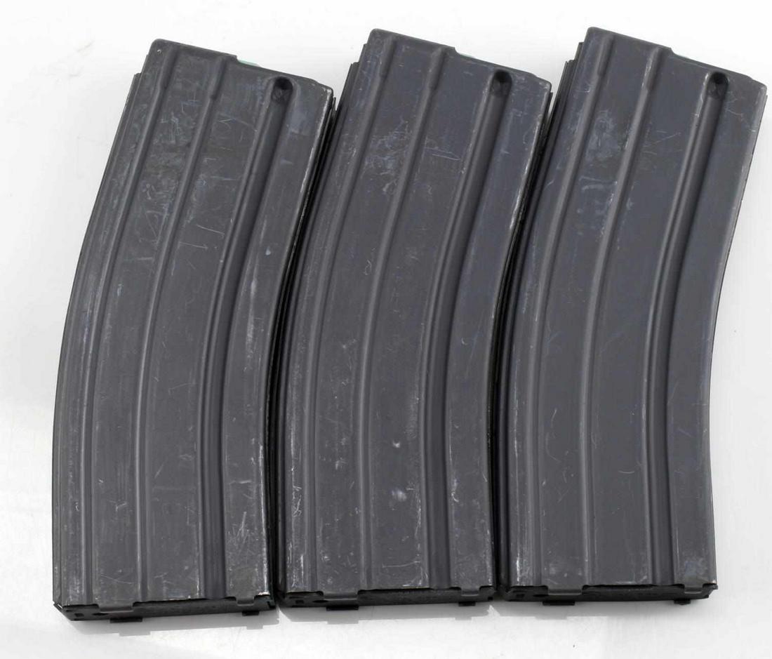 3 COLT MARKED 30 ROUND AR15 MAGAZINE LOT: Marked Colt on base and body with green followers. slightly used.