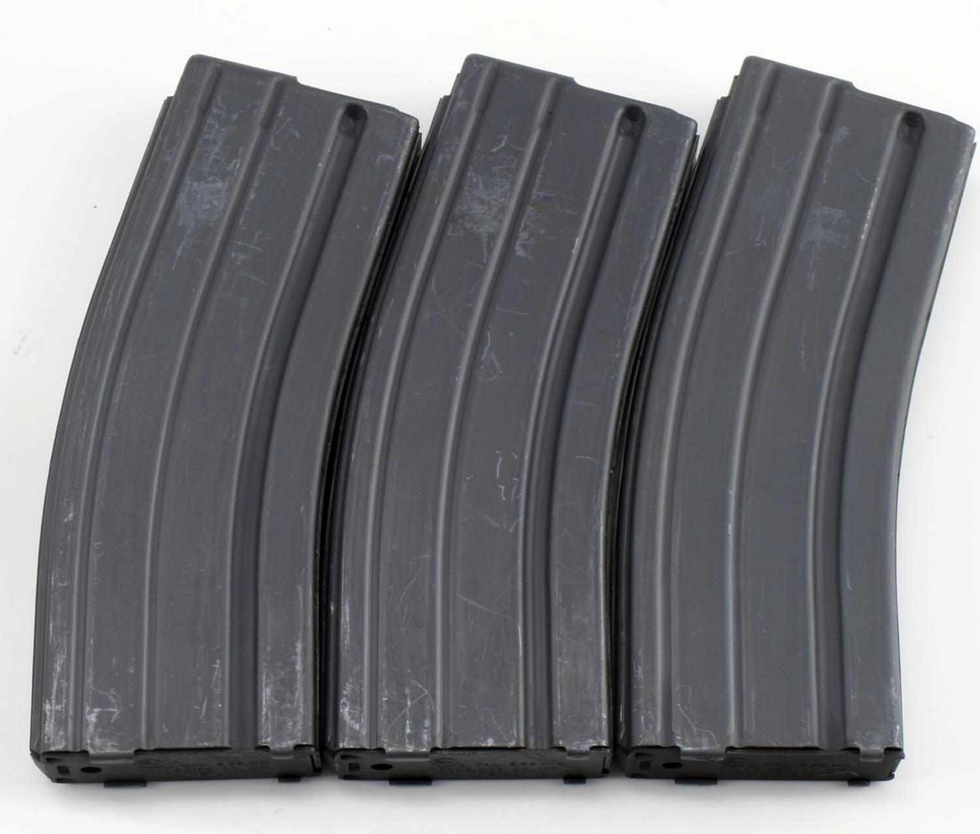 3 COLT MARKED 30 ROUND AR 15 MAGAZINE LOT: Marked Colt on base and body with green follow through, slightly used. This lot has a reserve.
