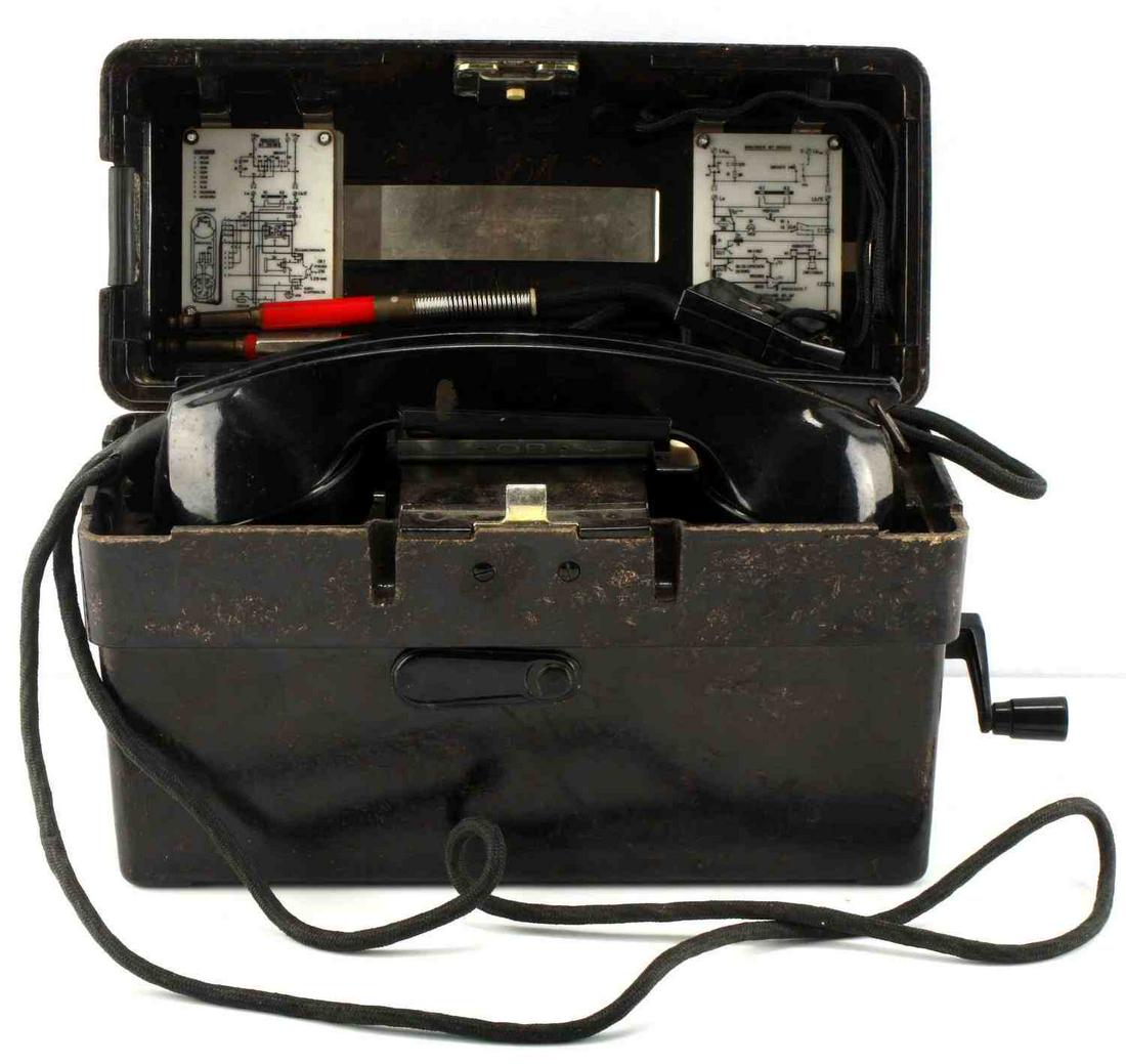 GERMAN MILITARY FIELD TELEPHONE DATED 1960: German Military Field Telephone produced by "STANDARD ELEKTRIK LORENZ" dated 1960. Side of box is stamped with number 1/67. Features phonetic German alphabet on top and wiring schematics on inside. Ha