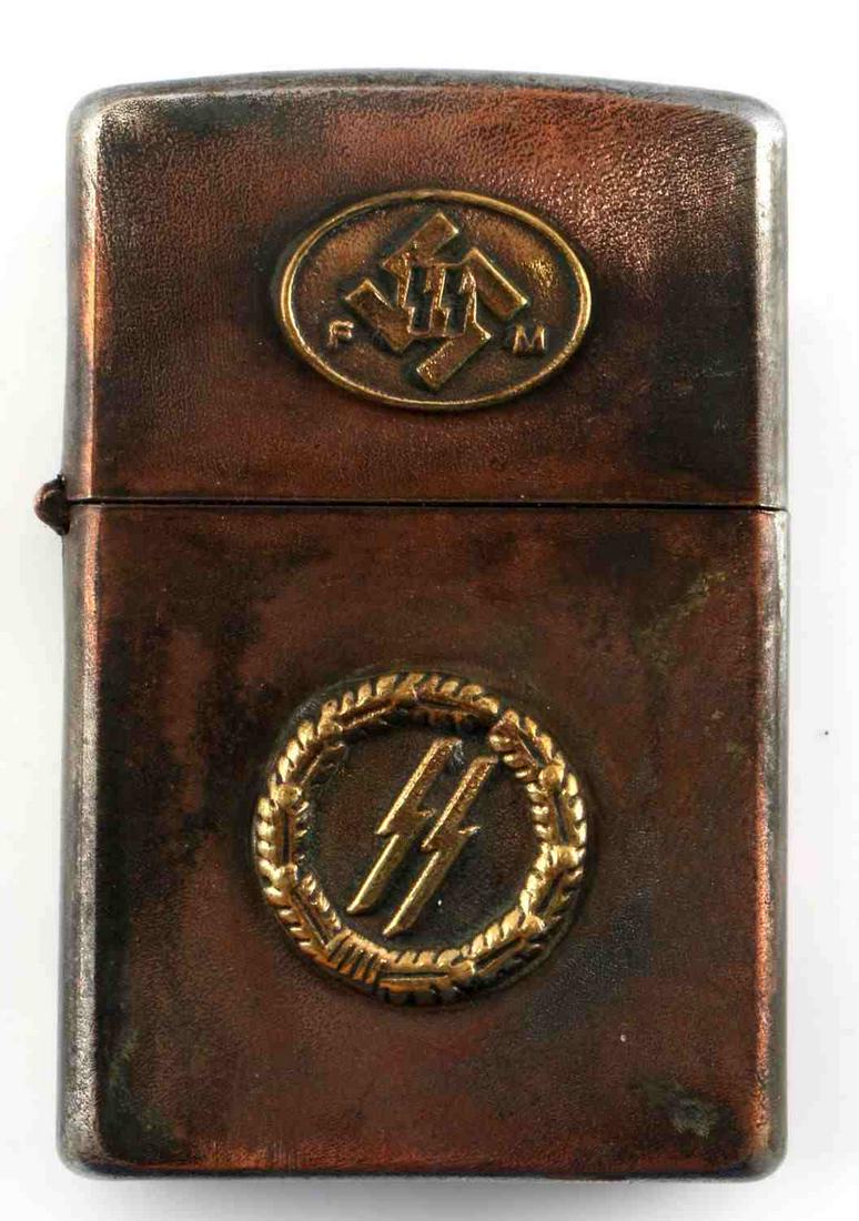 WWII GERMAN 3RD REICH WAFFEN SS CIGARETTE LIGHTER: Waffen SS zippo-style lighter. Opens well, all mechanics are in tact. Sparks are still produced when lighter is struck. Moderate oxidation, in very good condition. Unauthenticated, sold as is. This lo