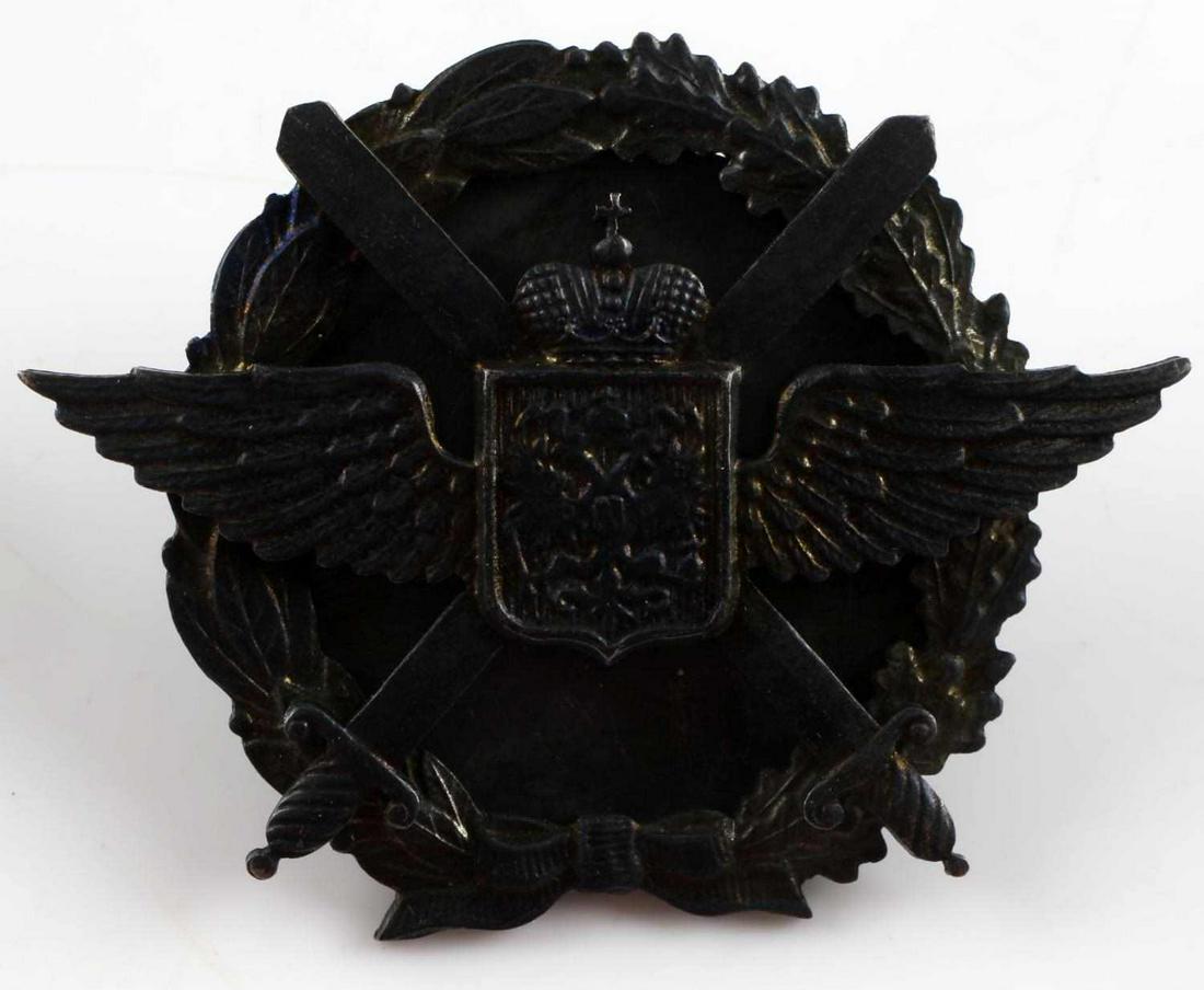 WWI IMPERIAL RUSSIAN ARMY AVIATOR PILOT BADGE: WWI Imperial Russian Army Aero Aviator Czar Nicholas Era Pilot Badge. Measures 1 7/8” wide by 1 7/16” tall. The front shows The Imperial Russian Double headed eagle coat of arms in the center flan