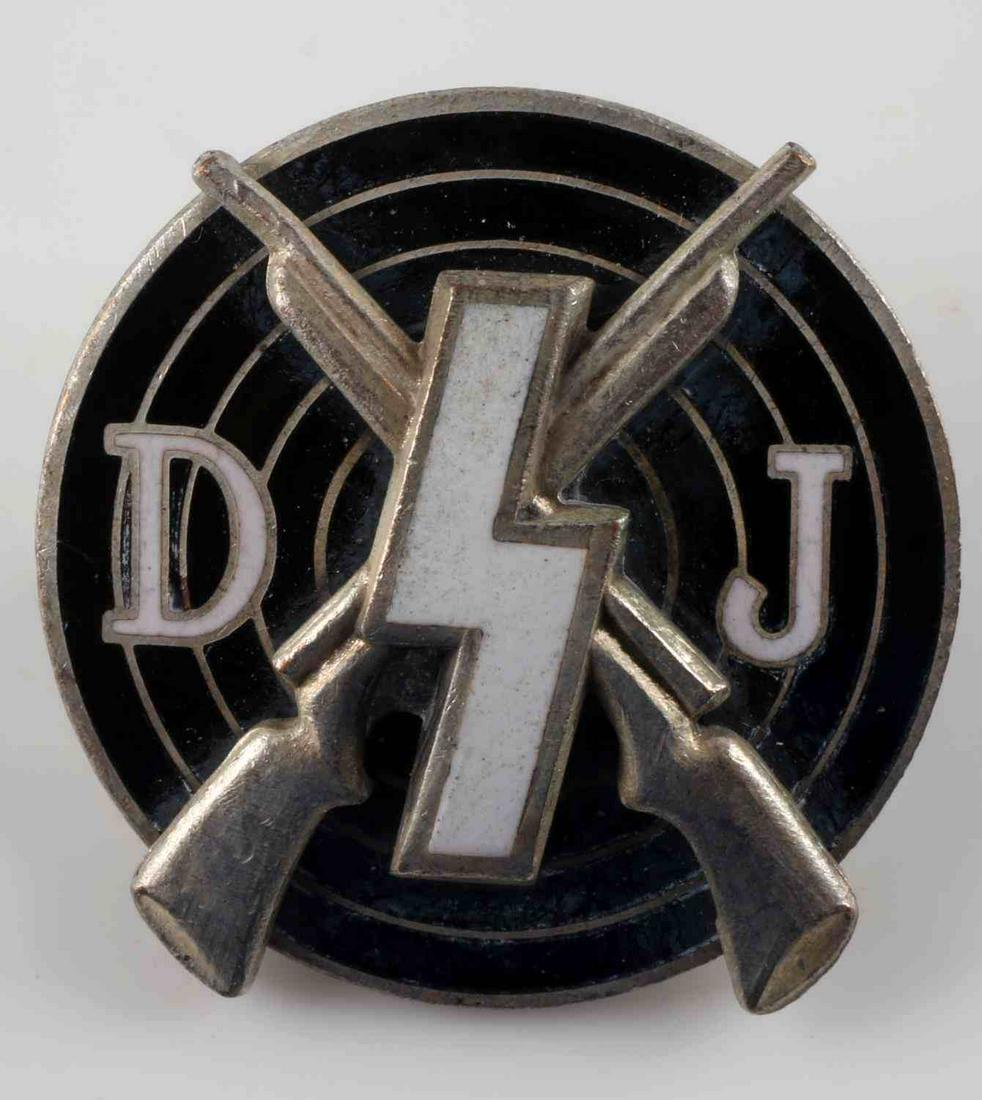 WWII GERMAN THIRD REICH YOUTH DJ MARKSMAN BADGE: German WWII Deutsches Youth DJ Marksman Shooting Award. Measures 13/16” in diameter. The reverse side is maker marked ‘RZM M1/123’. Has a thin horizontal safety pin back. Two piece nickel constr