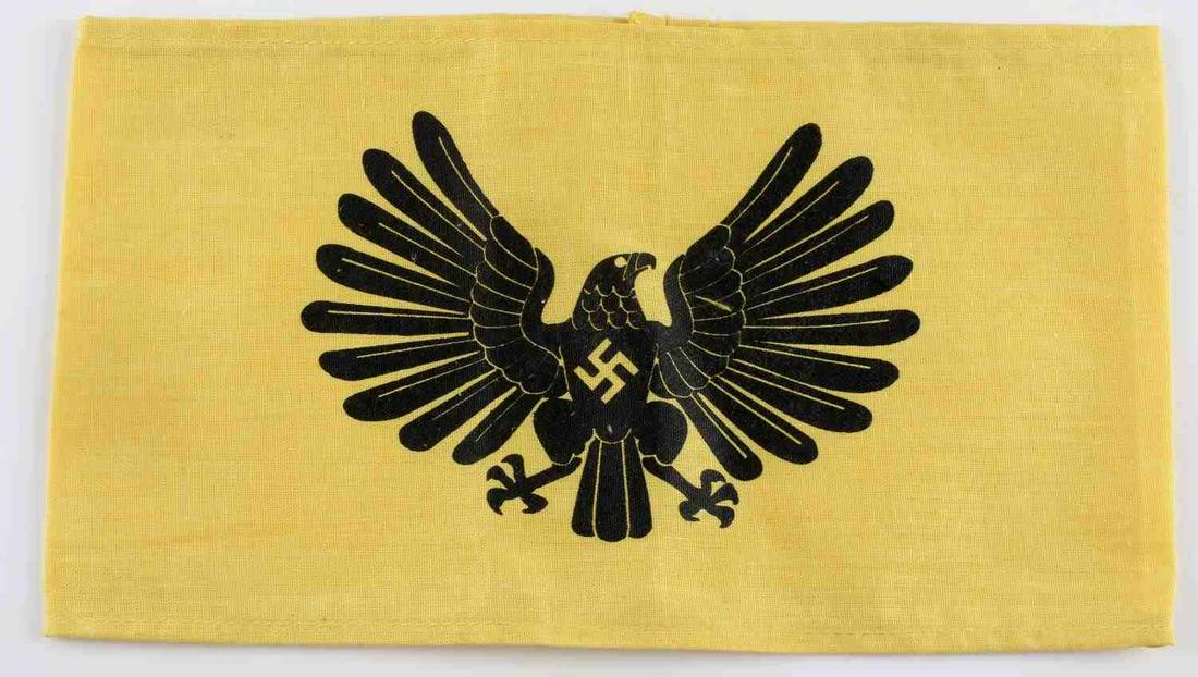 WWII GERMAN THIRD REICH DEUTSCHES JUGEND ARM BAND: German World War II Female Deutsches Jugend Youth Eagle Arm Band. Measures 9 inches wide by 5 1/8 inches tall. The front shows a spread winged eagle with a swastika in the center of his chest. One pie