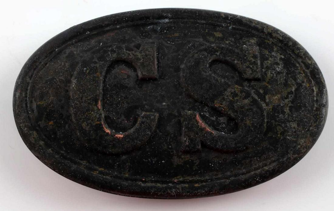 CONFEDERATE CIVIL WAR ENLISTED MANS BELT BUCKLE: Confederate States CS Civil War 1861 – 1865 Enlisted Mans Belt Buckle. Measures 3 3/8” wide by 2 1/8” tall. The front reads ‘CS’ in the center of an oval belt buckle. Has three brass prongs 