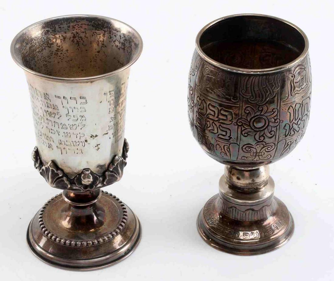 LOT OF 2 SILVER JUDAICA KIDDISH CUPS GERMAN SILVER: The lighter cup (129 grams) has ornate design at bottom and hallmarks at bottom rim (13 DF), measures 5.5 inches tall, base is loose. The second one is heavier (203 grams) with tooled design, 5.5 inch