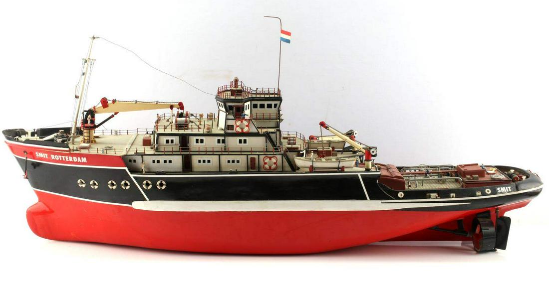 SMIT ROTTERDAM SEA GOING TUG BOAT 1:75 SCALE MODEL: Wood scale model of ocean going tug Smit Rotterdam, missing Stacks, otherwise seems complete, measures 37 by 8 by 12 inches.missing parts are separate.