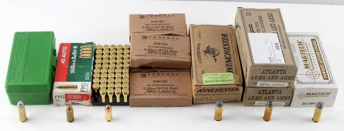 414 ROUNDS OF .45 .44 AND 5.56 MM AMMO DIFF BRANDS: Lot includes: 50 rds of loose S&B .45 auto, 5 boxes of 20-rd 5.56 mm Federal Ammunition, 2 boxes of Atlanta Arms & Ammo 50-rd .45 Long Colt 200 gr., green case with 45 rounds of .44 REM MAG, opened bo