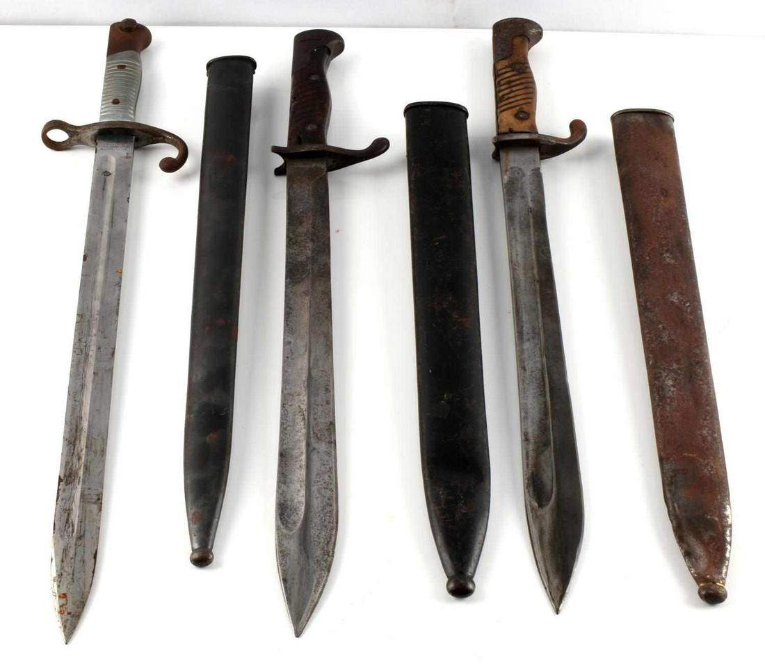 1891 SPANISH MAUSER & GERMAN WWI SUHL BAYONET LOT: Two Suhl German Mauser bayonets with scabbards, dented, very good blades and one Toledo 1891 Spanish Mauser bayonet