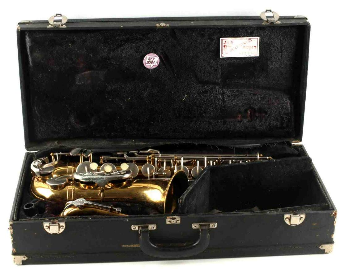 VITO ALTO SAXOPHONE & CASE FOR BEGINNING STUDENTS: Made in Taiwan. Serial no. 807911. Good condition. Some verdigris on the keys and around the bell, but that does not interfere with this instrument's ability to produce a vibrant, full sound. Missing 