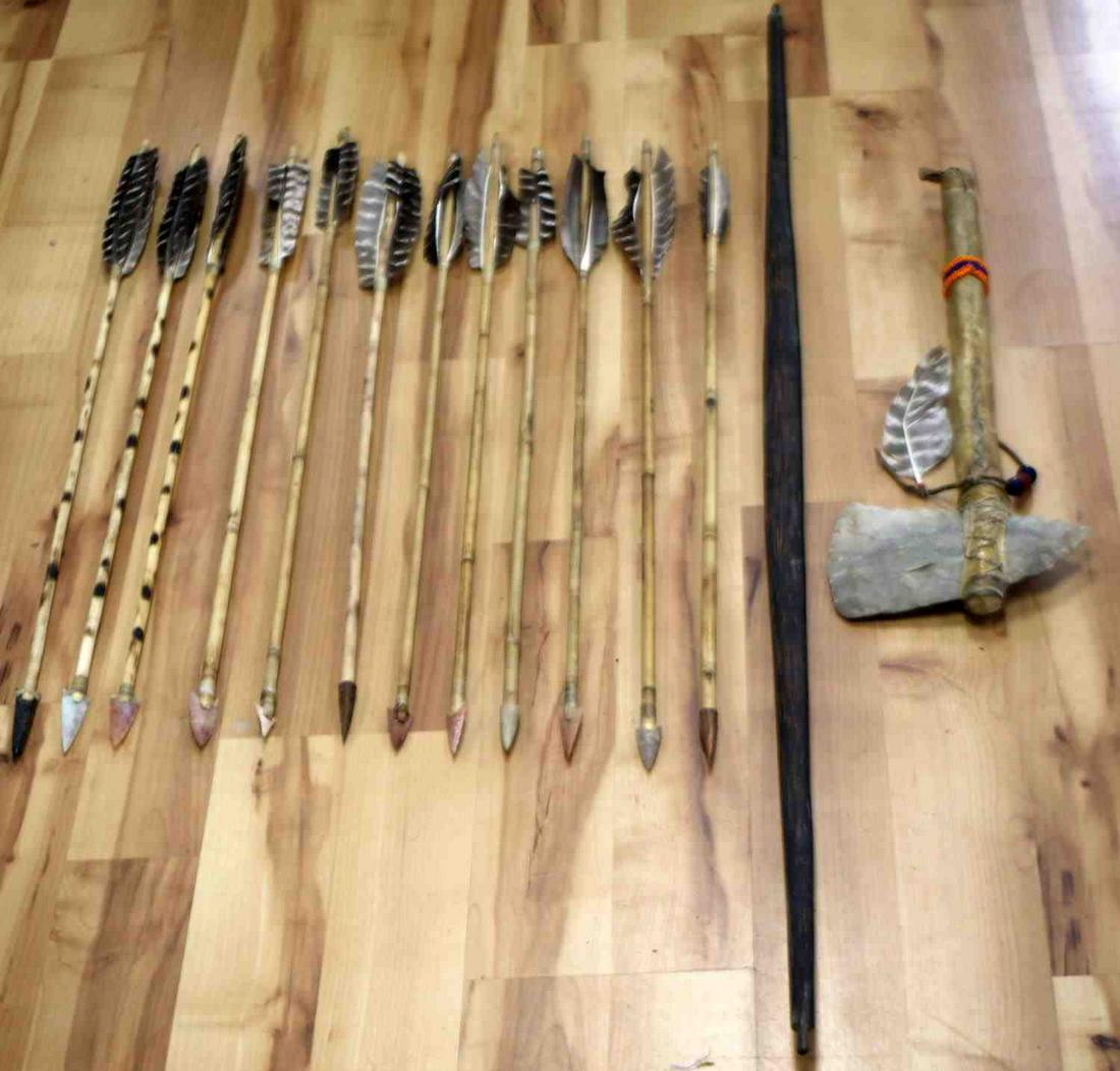 NATIVE AMERICAN REINACTMENT TOMAHAWK BOW & ARROWS: Tomahawk handle measures (56.5 cm) while the stone axe measures (20 cm). Bow comes with no string measures (129.9 cm). 12 arrows with various stone arrowheads (78.5 cm-82.5 cm).