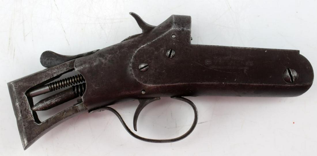 J STEVENS SINGLE SHOT 12 GAUGE SHOTGUN RECEIVER: Receiver and trigger only. Maker marked to both sides. Believed to be chambered for 12 gauge shells. Brown patina, action is sticky. Fair condition. Requires FFL for transfer. Cannot ship internationa