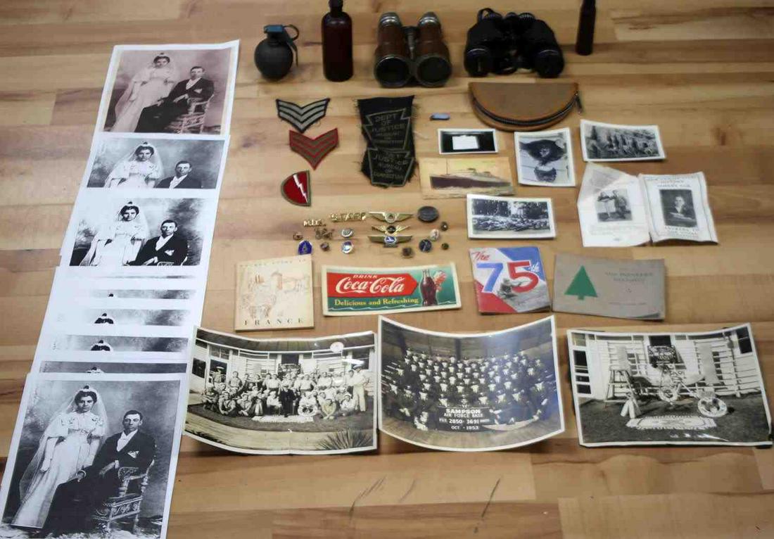VARIETY MILITARY EPHEMERA GENERAL ANTIQUE LOT: Grouping includes antique bottle, civil war binoculars with clear optics, working Paris made, Johnny Eck history, US Navy photo groups 3, airline Jr. Pilot and Stewardess wings, pins, cloth military p