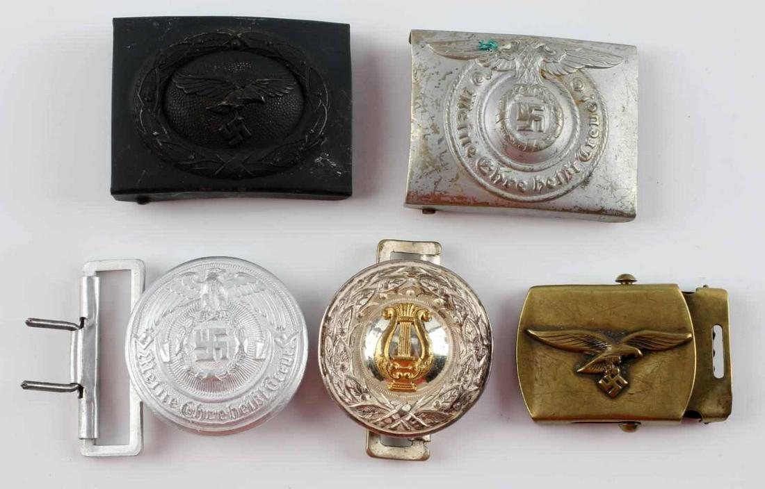 WWII GERMAN THIRD REICH LOT OF 5 BELT BUCKLES: This lot contains 5 belt buckles, 4 of which are WWII German Belt Buckles. 2 are SS Belt Buckles and 2 are Luftwaffe Belt Buckles. The other 1 belt buckle appears to be a 1920s/1930s post WWI Civilian