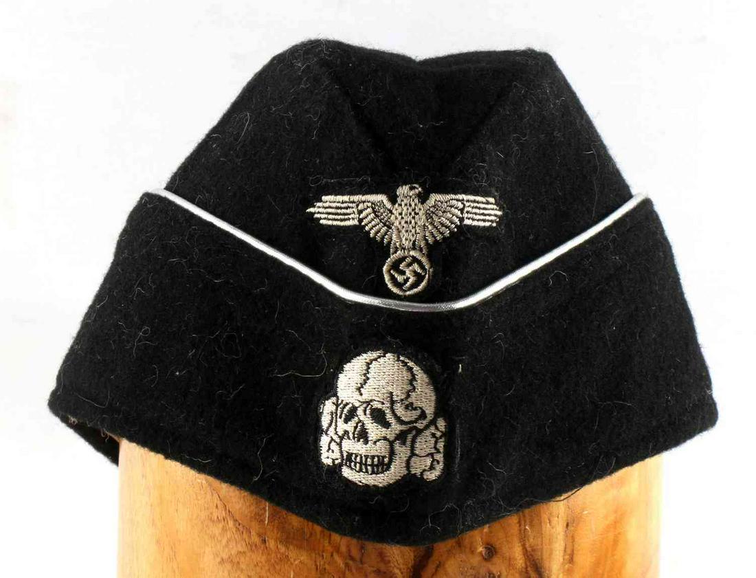 GERMAN WWII THIRD REICH WAFFEN SS OFFICER CAP: German Third Reich Waffen SS Panzer Officer Overseas. Does not Fluoresce. In very good, wearable condition. Eagle and Totenkopf on front. Unauthenticated, sold as is. This lot has a reserve.