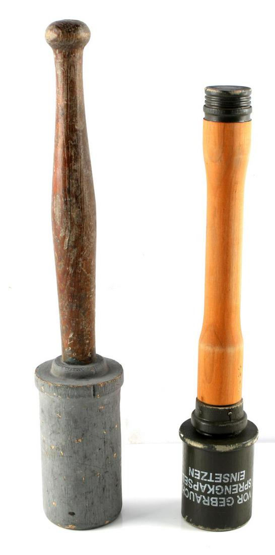LOT OF 2 WWII GERMAN PRACTICE STICK GRENADES: Two grenades: one is made of complete wood, 16 inches, the other is made of wood with metal cap and collar piece, marked Vor Gebrauch Sprengkapsel Einsetzen and Reichsadler at bottom, 14 inches. Both 