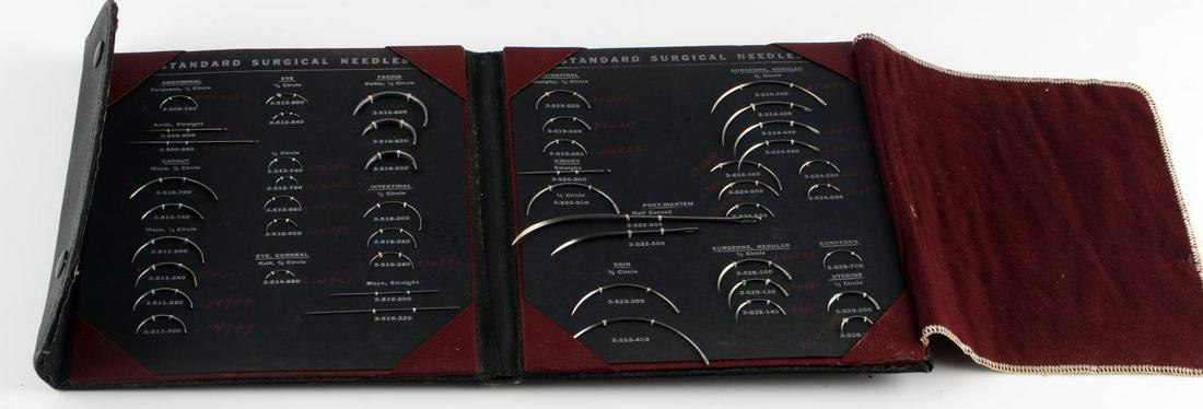 ANTIQUE MILITARY SURGICAL NEEDLE COMPLETE SET: 48 piece complete set of Standard Surgical Needles. In very good condition. Comes in a black leather case with red cloth divider. Snap close case in good condition. All needles come labeled by size an