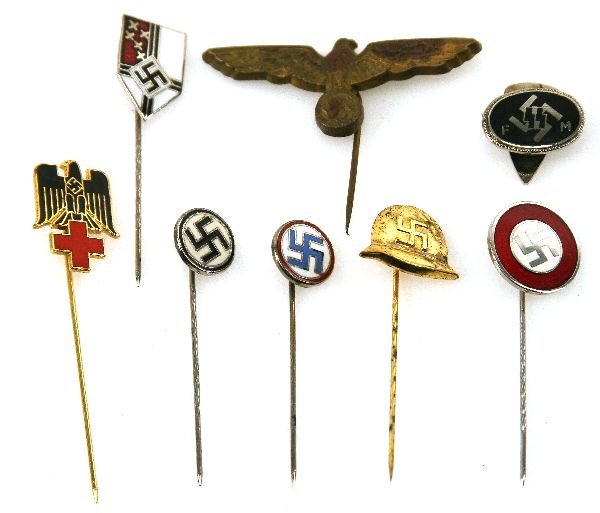 THIRD REICH SS FUNDING MEMBER BUTTOM HOLE BADGE: Black enameled civilian supporter of the SS badge with button hole type fixing to the rear. RZM marked and maker stamped 1/17. Together with a small lot of stick pins