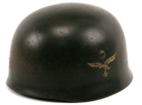 WWII GERMAN FALLSCHIRMJAGER "PARATROOPERS" HELMET: A good example of the German Luftwaffe paratroopers helmet. Field green finish with single Luftwaffe eagle decal to the left side (about 90%). Some rust spotting and minor scratching. (Paint about 95%
