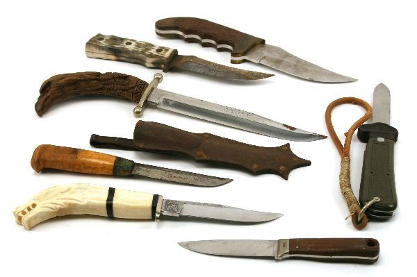 BOX LOT OF KNIVES: Notably; a Van Esler with carved Ivory grip; a large Rigid custom bowie; a German Bundesweir gravity knife; a custom knife with eagle head carved grip; a woodmans pal machete and others. (10).