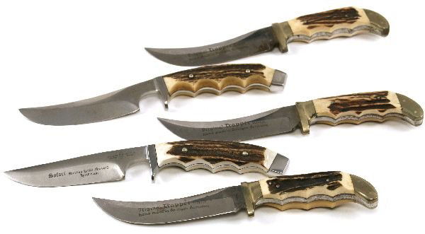 GERMAN MADE HUNTING KNIFE LOT OF 5: To include; The Original Trapper by Edge Mark. plus 2 other similar; A knife by Henckels and one by Wingen. All have 5 inch blades and stag horn grips. Used but Very good condition.