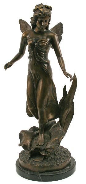 BRONZE STATUE OF A NYMPH BY P JOHNSON: Cold cast bronze nymph by P Johnson and standing 25 inches tall on its marble base. Good detail. Very good condition.