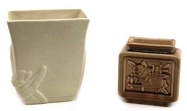 2 LOT ROOKWOOD POTTERY VASES FLOWER MOTIF: Item 1 is matte finish rectangular vase 6 inches tall. mint condition and bottom carries flame mark, "LVII"(1957) #7057 and "ROOKWOOD, CINTI, O". Item 2 is rectangular 4 inch brown iris glaze vase, ma