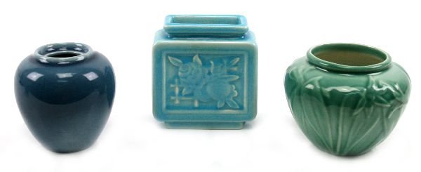 3 LOT ROOKWOOD POTTERY BUD VASES: Item 1 is mink condition #6431 floral design in green iris glaze. 3 inches tall. Bottom carries flame mark, "6431", "ROOKWOOD, CINTI, O". No crazing. Item 2 is mint condition #6474 rectangle vase 4 in