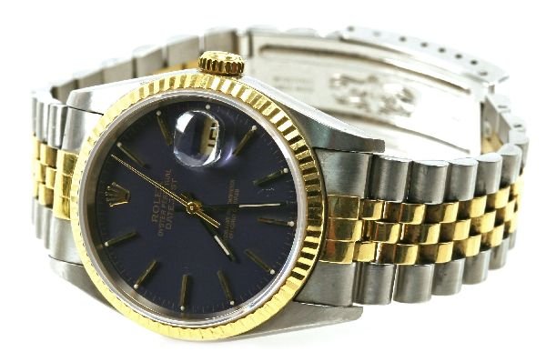 MENS 18K/SS ROLEX DATEJUST WATCH: Men's SS/18k Gold Rolex Datejust wrist watch. SN# 5823926. Stainless Steel case with 18k Yellow Gold fluted bezel (35mm). Stainless Steel & 18k Yellow Gold Jubilee bracelet. Blue Dial with gold marker