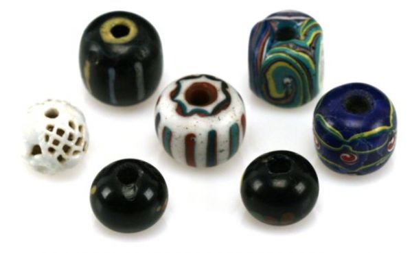 6 EDO RARE GLASS BEADS PLUS WHITE IMARI OJIMEI : Six Edo 1600-1868 rare glass beads, 250 years old & one white Imari glass Ojimei bead about 250 years old also.