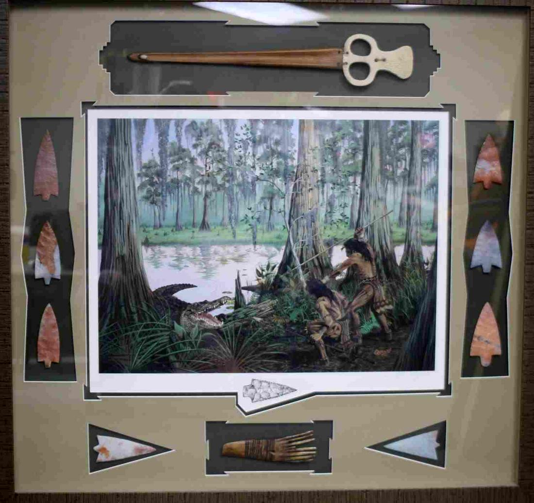 DEAN QUIGLEY SIGNED THE KILL LE PRINT W ARROWHEADS: Dean Quigley renowned Florida archaeological artist. Pencil signed Limited Edition print of The Kill, 302/500, professionally framed in shadow box styling with Atlatl, arrowheads and scrapper. In exce