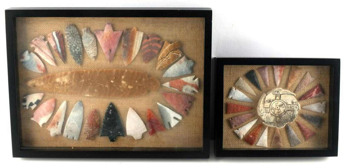 BOXED SET NATIVE AMERICAN ARROWHEAD CORAL HOMAGE: Lot includes 2 framed sets of arrowheads. Largest frame (40.7cm L x 30.6cm W) holds a spear point and 21 arrowheads with some made of coral. Smaller frame (25.5cm L x 20.4cm W) holds 18 arrowheads wit