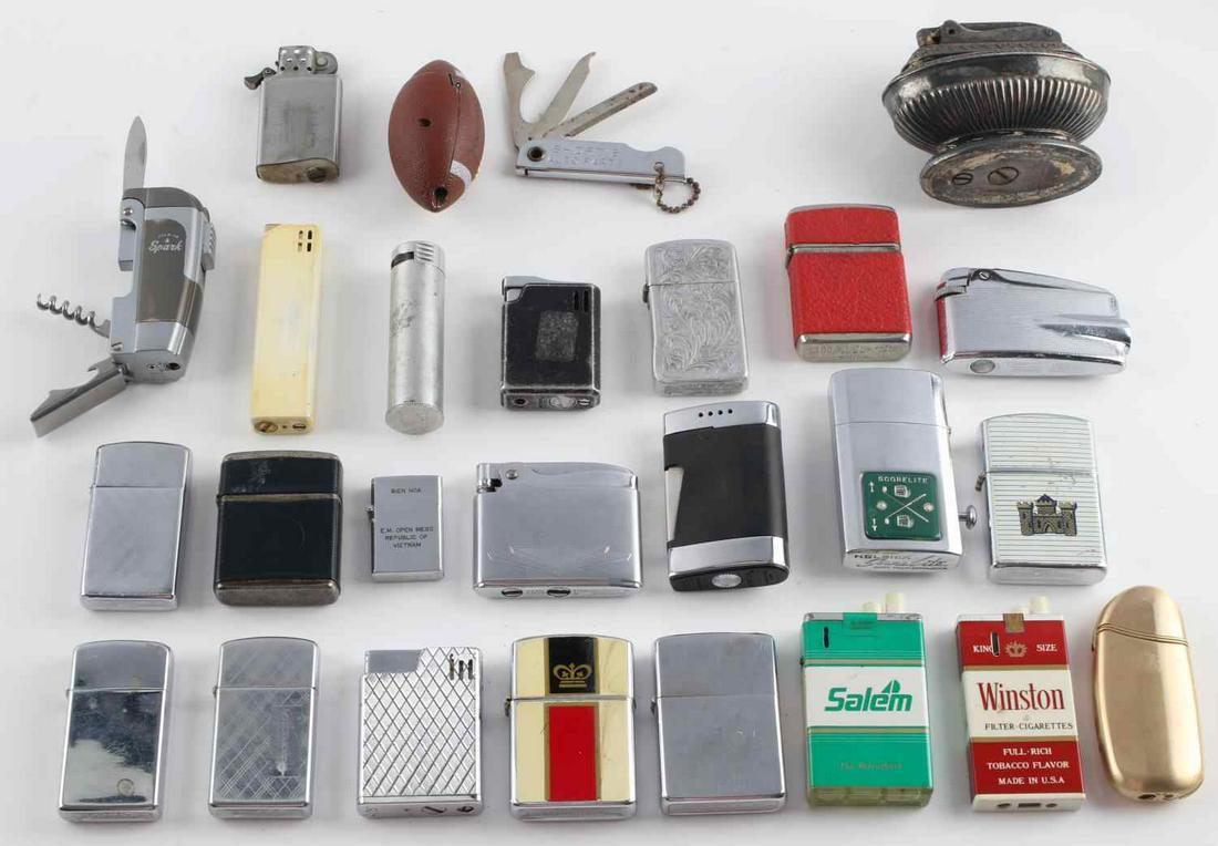 VINTAGE ZIPPO RONSON CHAMP AMSTEL FLIP LIGHTER LOT: Lot contains 25 lighters. Some vintage, some not. Four Zippo lighters, three Ronson lighters, one Park lighter, one Champ lighter, one Amstel lighter, one football lighter, and one Spark multi-tool li