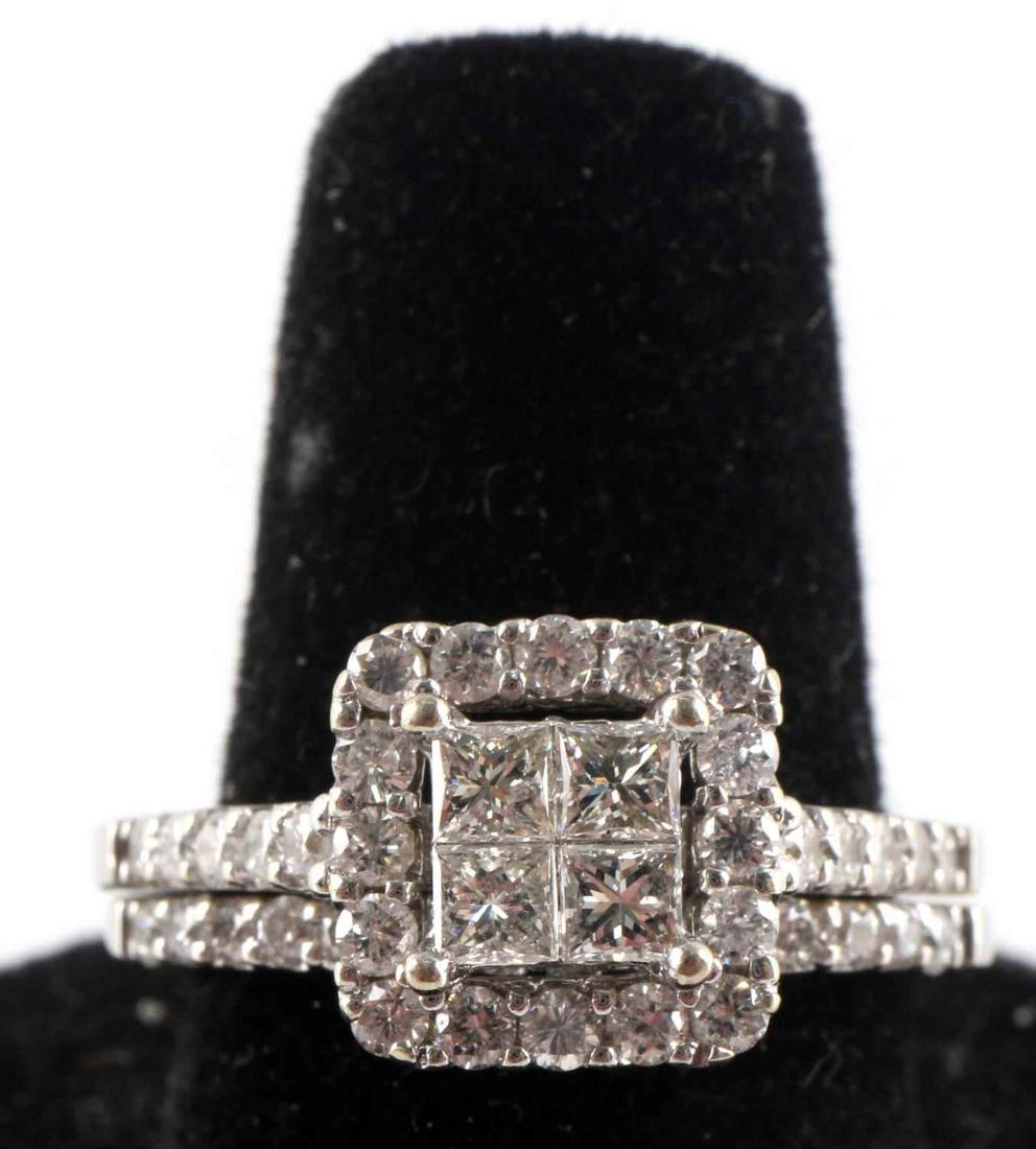 14 KT GOLD DIAMOND HALO ENGAGEMENT RING: Engagement wedding ring set size 7 12. Four 2.4mm princess cut diamonds with a halo and band accent of of thirty round 1.4mm diamonds. Est. TCW of 0.7carats. EST. Clarity SI, color I-K set in 14kt whi