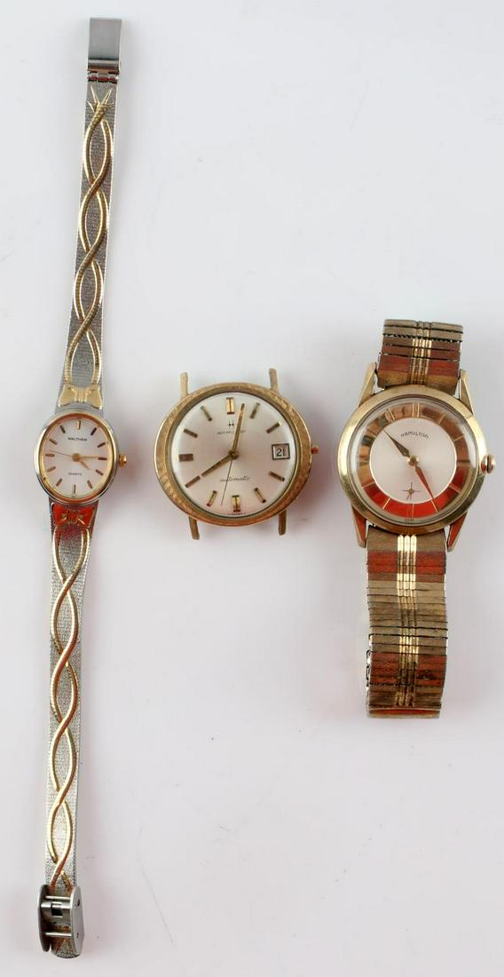 VINTAGE HAMILTON WALTHAM WRIST WATCH LOT: Three watches in total. Two Hamilton 10 kt rolled gold men's wrist watches, one is missing the wind, stem and band but is currently working. The other Hamilton will start but not hold. Waltham ladies 