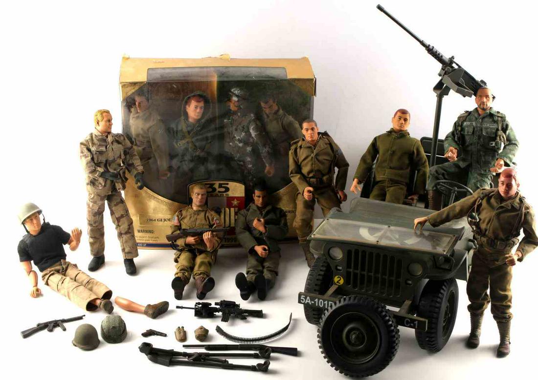 G.I JOE ACTION FIGURE JEEP AND BOX LOT: Lot contains 12 action figures, one jeep, one 35 year anniversary G.I. Joe Land Warrior box, and various weapons and clothing.