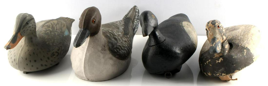 VINTAGE PLASTIC & WOOD DUCK DECOY LOT OF FOUR: Lot includes 4 duck decoys (1) JC Higgins Pintail Drake canvas duck decoy with glass eye measures 16" by 8" (2) Woodstream corp plastic Victor duck decoy. 15" by 7" (3) White Winged Scoter wooden duck