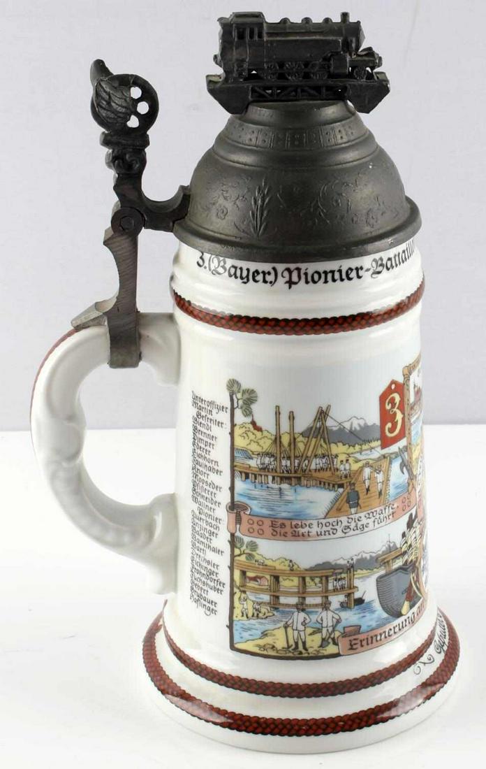 WWI LITHOPAINE BEER STEIN 3RD BAYERN BATTALLION: Post WWI Lithopaine Etched Beer Stein for a man in the 3rd Bayern Pionier Battallion, Ingolstadt. Very colorful format with Bavarian crest and soldiers in spiked helmets working on projects. There is 