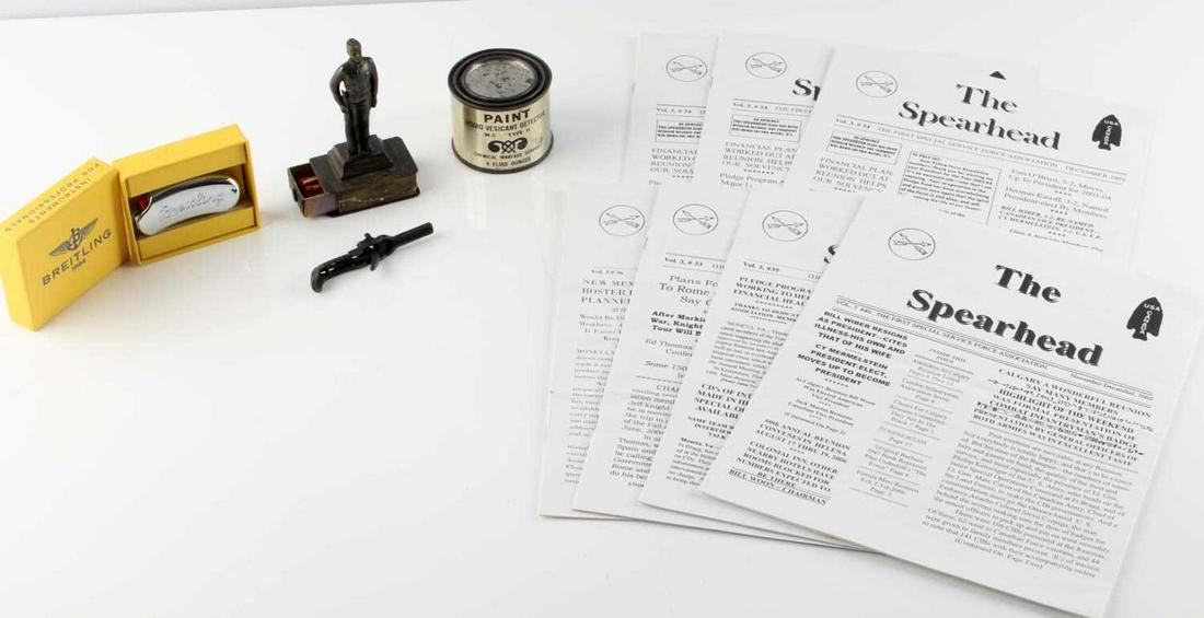 BREITLING LIGHTER MILITARY MATCH BOX & PISTOL CAP: Lot includes 1 Breitling lighter, new and in box, 1 military soldier matchbox holder, 1 pistol cap gun toy, 1 can of liquid paint vesicant detector, and 1 lot of FSSF veteran newsletters.