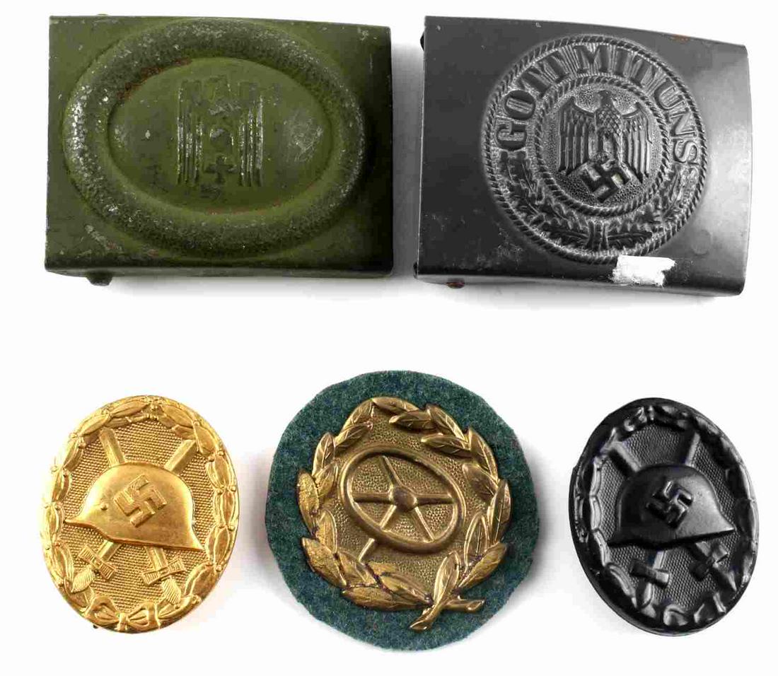 WWII GERMAN THIRD REICH BUCKLE WOUND BADGE LOT: Includes German Red Cross NCO belt buckle, Heer belt buckle, gold and black wound badge, driver sleeve badge, none of the items has back marks.