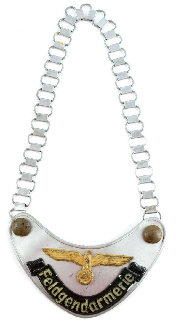 WWII GERMAN THIRD REICH SS POLICE GORGET: Feld SS police gorget , gorget measures 4.5 x 6.5, with a 10 inch chain, very good original condition with phosphorus paint.