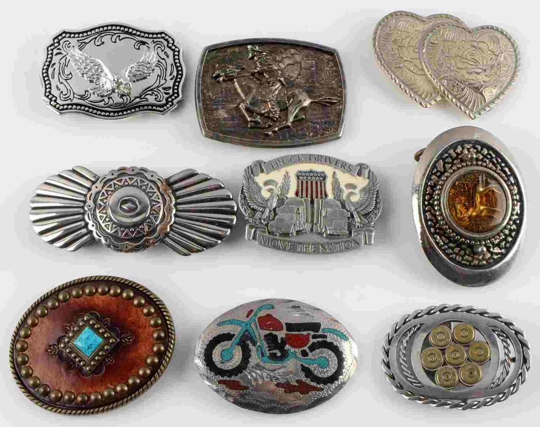 ASSORTED FASHION BELT BUCKLE LOT HUNTING TRUCKING: Lot of 9 belt buckles with a variety of themes: southwestern, hunting, trucking, and motorcycle. All pre owned in good condition.