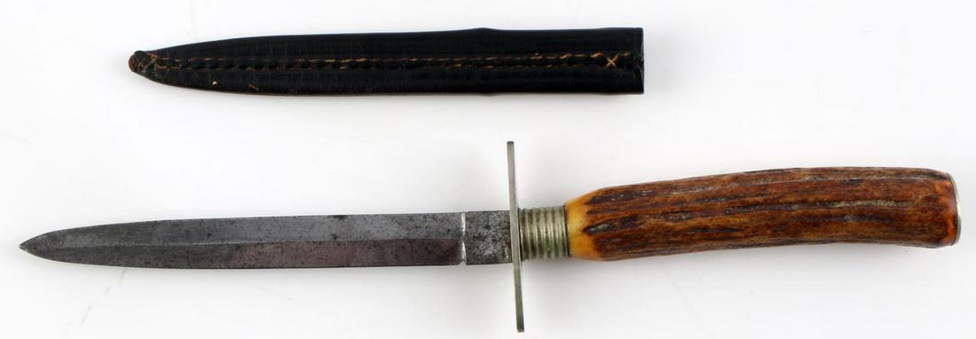 ANTIQUE CHALLENGE CUTLERY CO. DIRK DAGGER KNIFE: 19th century stag handled boot or Dirk knife. Very good original blade. Measuring overall 8 1/2 inches. With leather sheath.